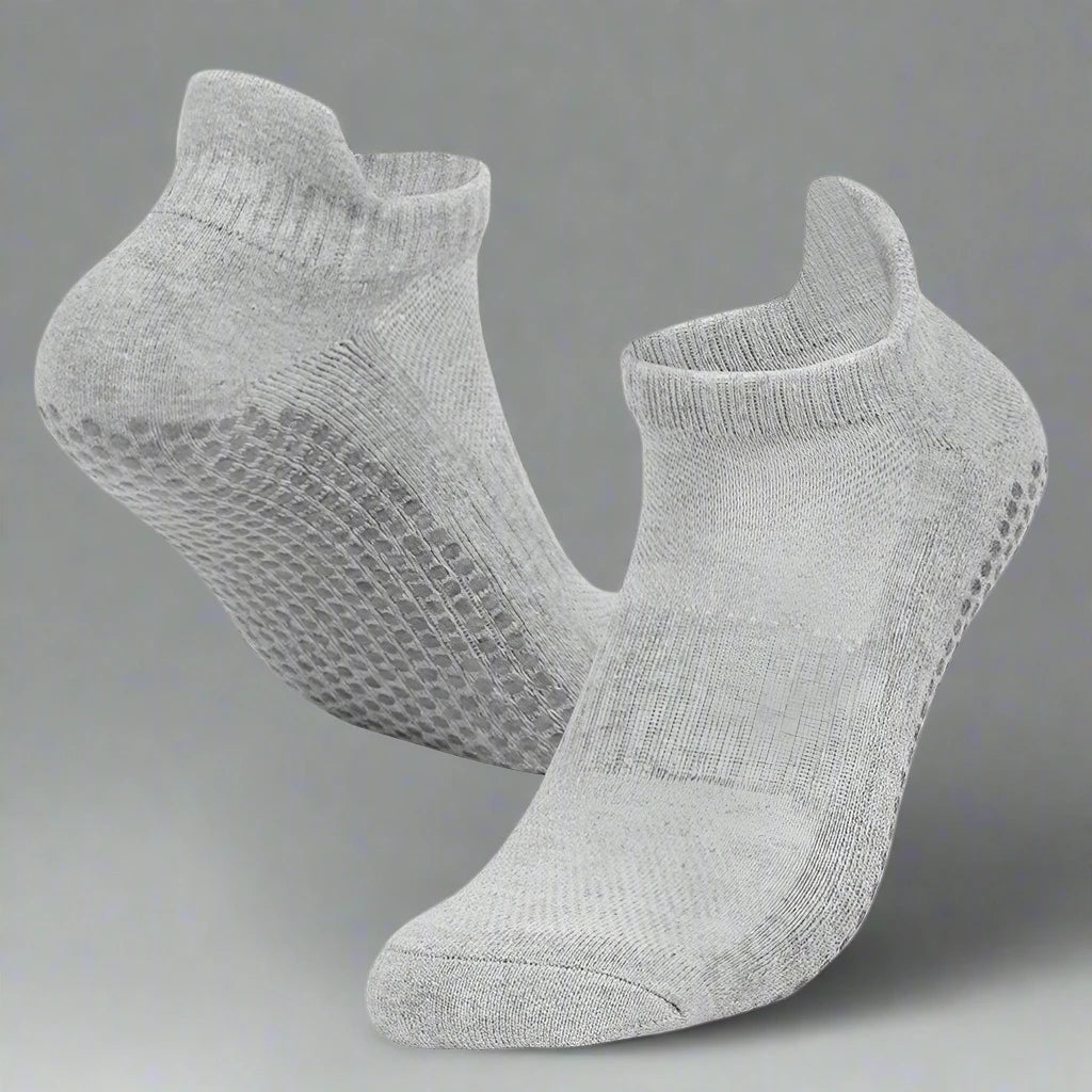 Pair of gray ankle socks on a white background