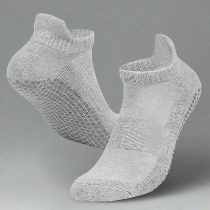 Pair of gray ankle socks on a white background
