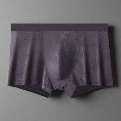 Purple boxer briefs with mesh design on a white background
